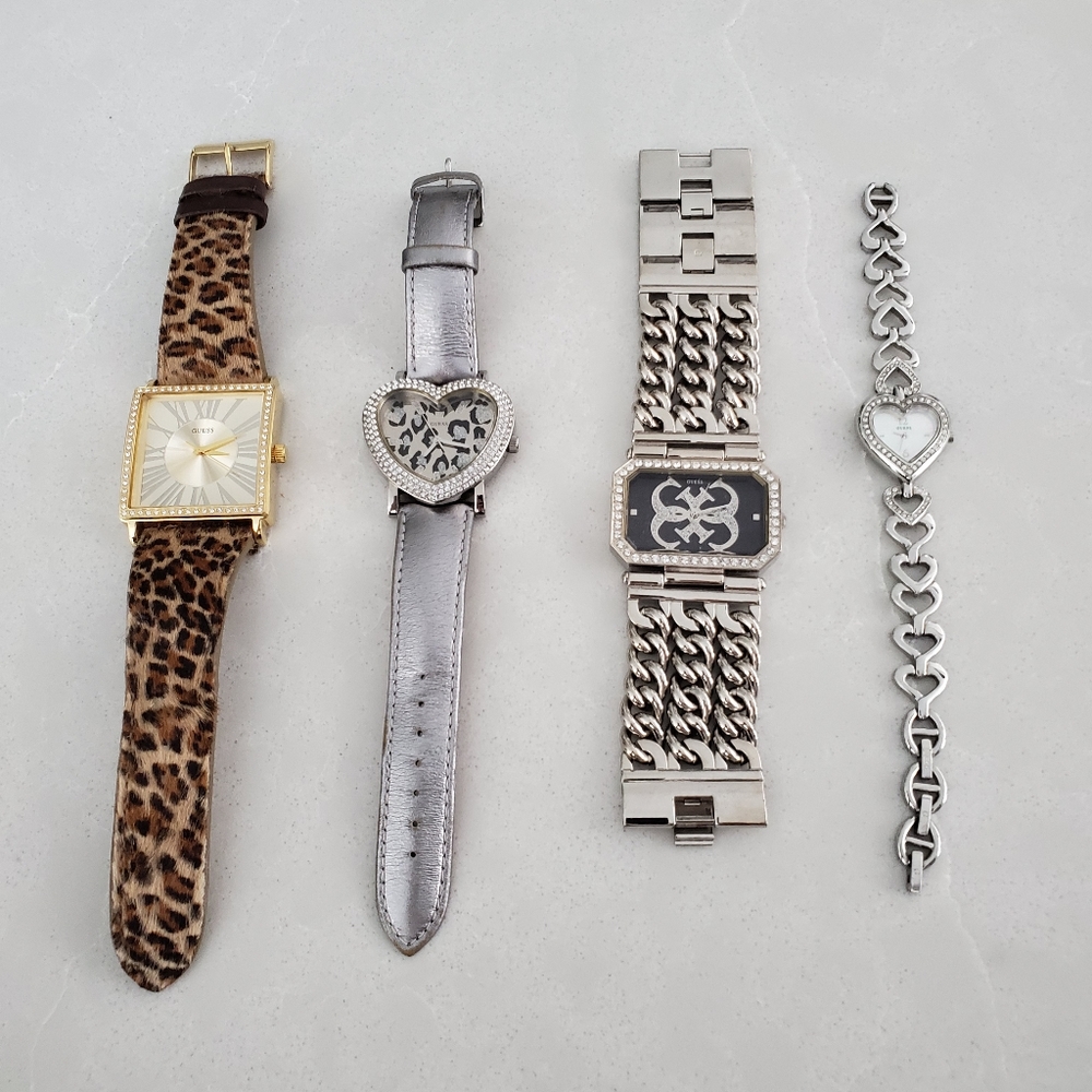 4 Guess watches. perfect condition. Needs Battery